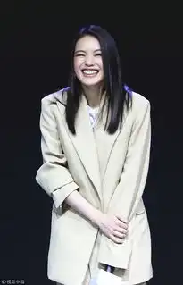 舒淇被疑怀孕后亮相宽松西装遮肚力挺黄渤