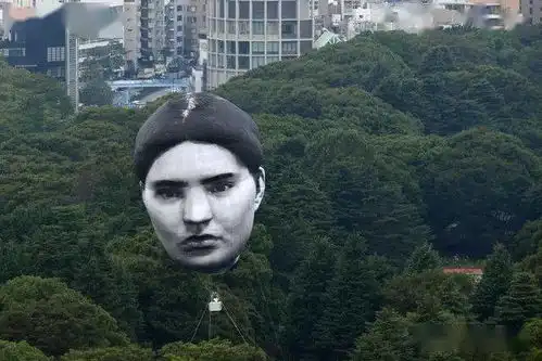 东京上空飘出个人脸大气球,竟是为奥运搞的惊喜网友吓死爹了
